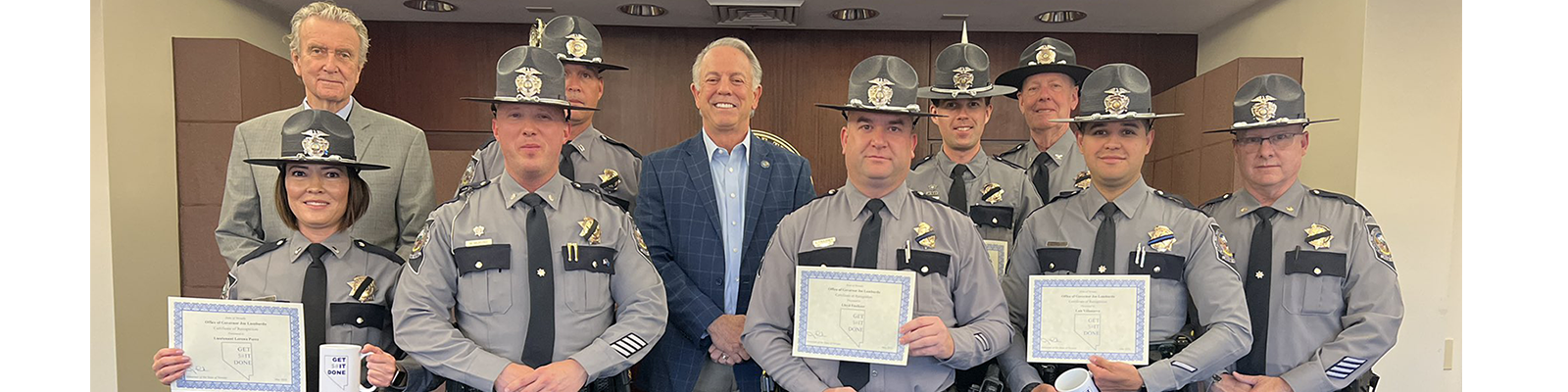 Governor Lombardo handing out Get Sh*t Done Awards to Nevada State Police Officers