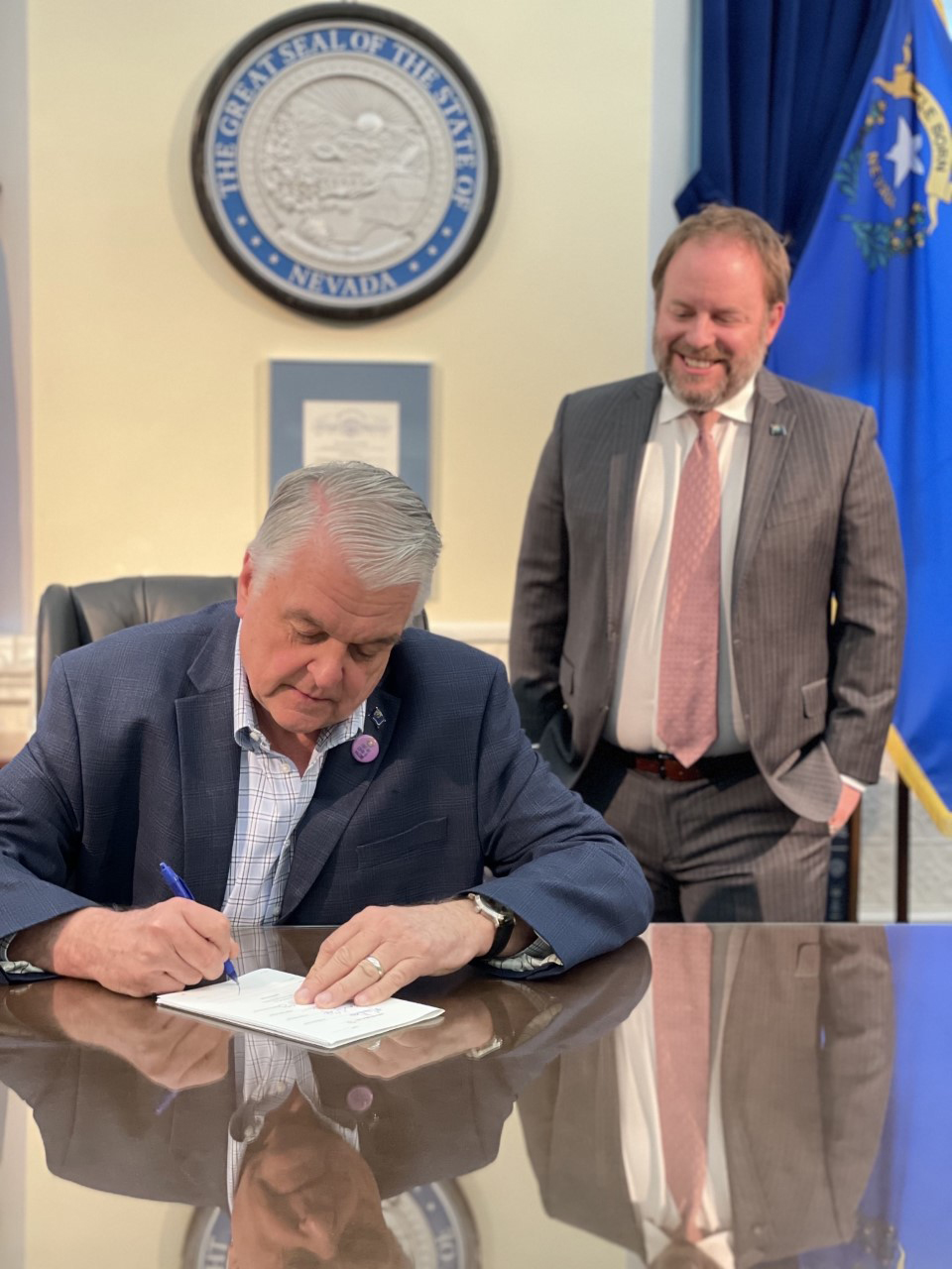 Governor Sisolak Signing SB 71 with Treasurer Zach Conine Photo 1