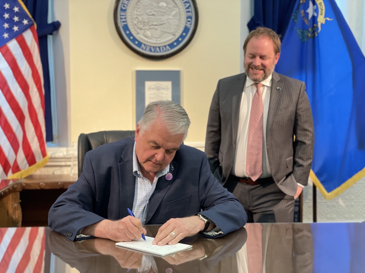Governor Sisolak Signing SB 71 with Treasurer Zach Conine Photo 2